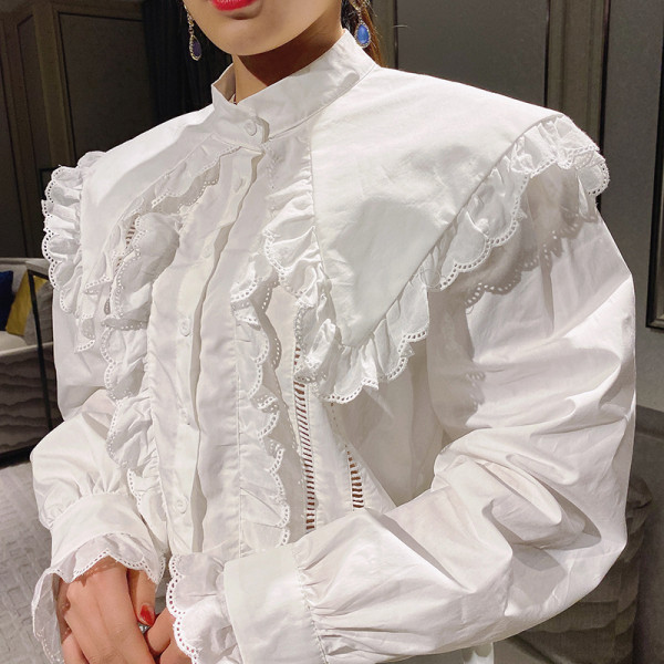 Modern női ing kerek nyakkivágással és fürtökkel