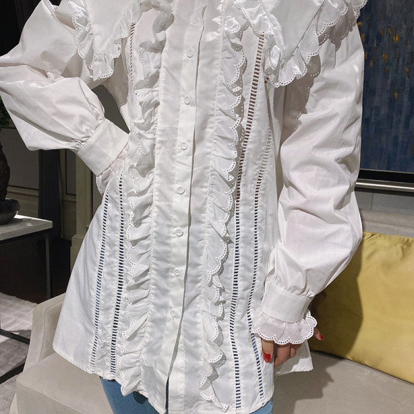 Modern női ing kerek nyakkivágással és fürtökkel