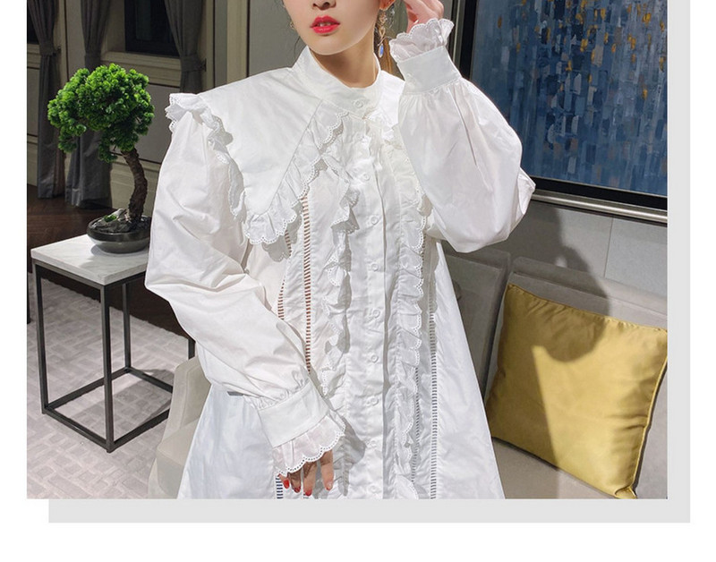 Modern női ing kerek nyakkivágással és fürtökkel