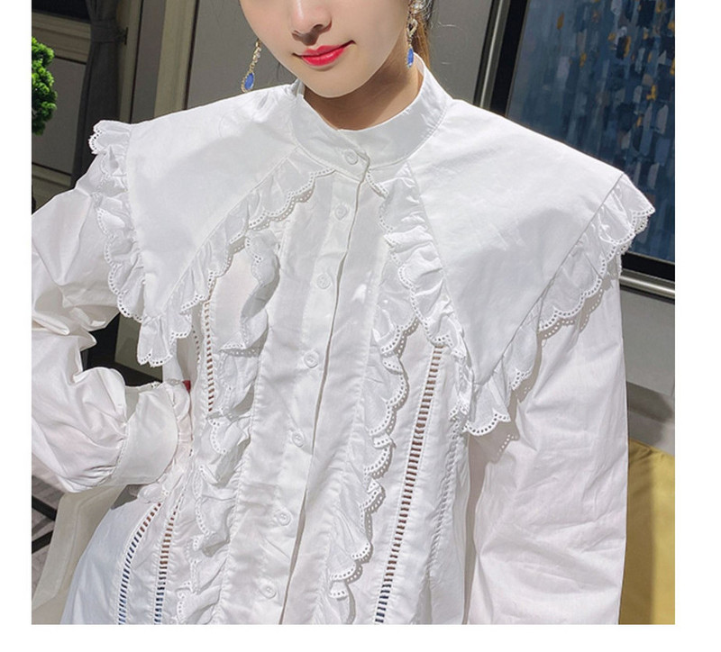 Modern női ing kerek nyakkivágással és fürtökkel