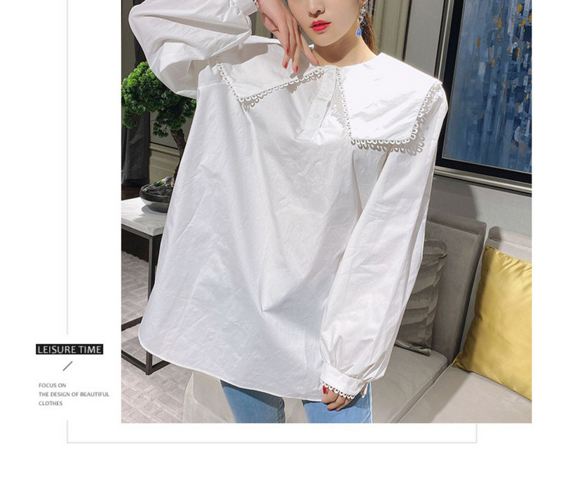 Női ing kerek nyakkivágással és gombokkal széles modell