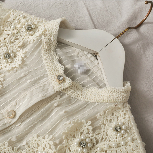 Retro stílusú női ing gyöngyökkel és kerek nyakkivágással