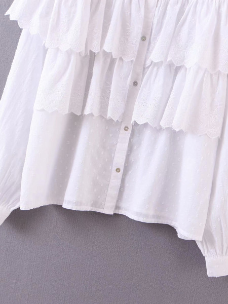 Női alkalmi fehér ing fürtökkel