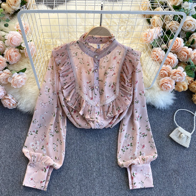 Lillemustri ja lokkidega naiste särk