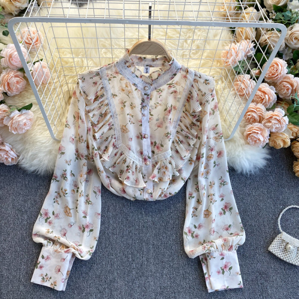 Lillemustri ja lokkidega naiste särk