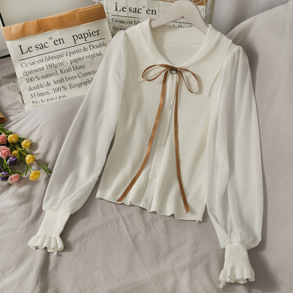 Női ing nyakkendővel és spitz nyakkivágással