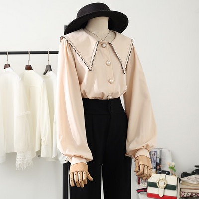 Uue mudeli naiste särk - ümara kaelusega ja pikkade varrukatega