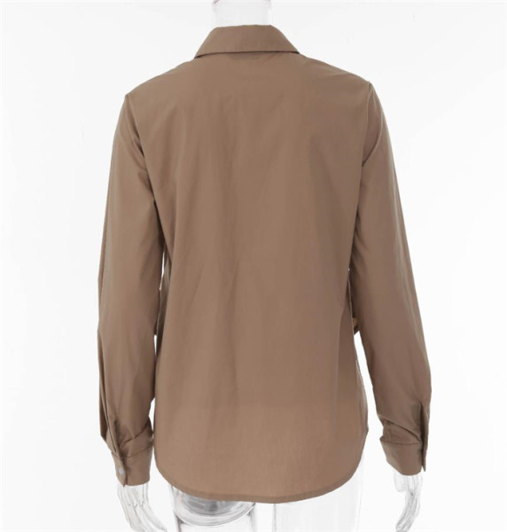 Pikk asümmeetriline lipsudega särk vöökohal