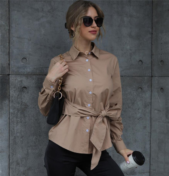 Pikk asümmeetriline lipsudega särk vöökohal