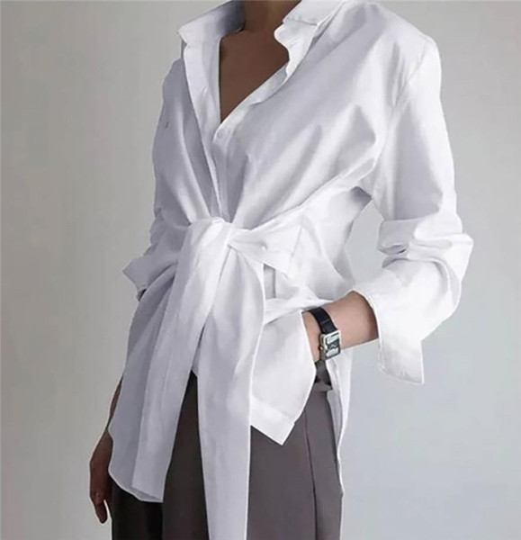 Pikk asümmeetriline lipsudega särk vöökohal