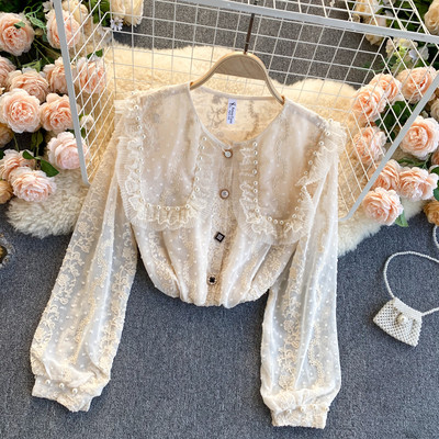 Moderna ženska košulja s perlama i gumbima