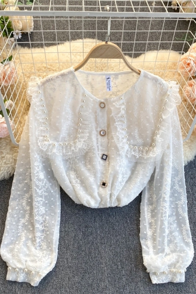 Moderna ženska košulja s perlama i gumbima