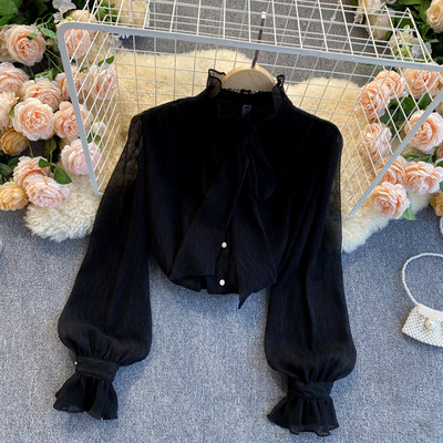 Erős női ing szalaggal és gombokkal