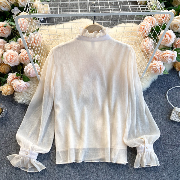 Erős női ing szalaggal és gombokkal