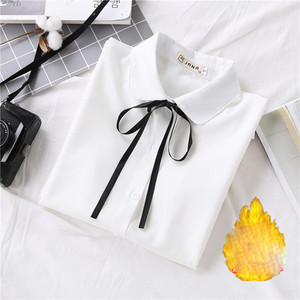 Modern női ing fehér szalaggal