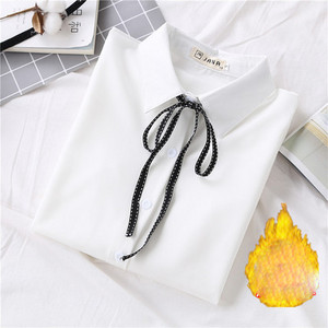 Modern női ing fehér szalaggal