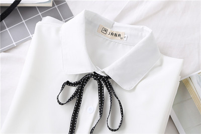 Modern női ing fehér szalaggal