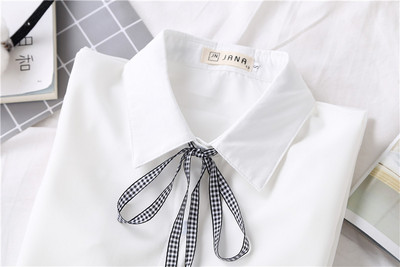 Modern női ing fehér szalaggal