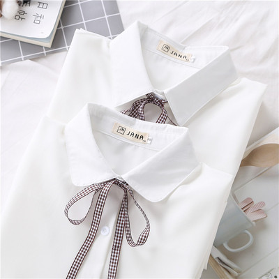 Modern női ing fehér szalaggal