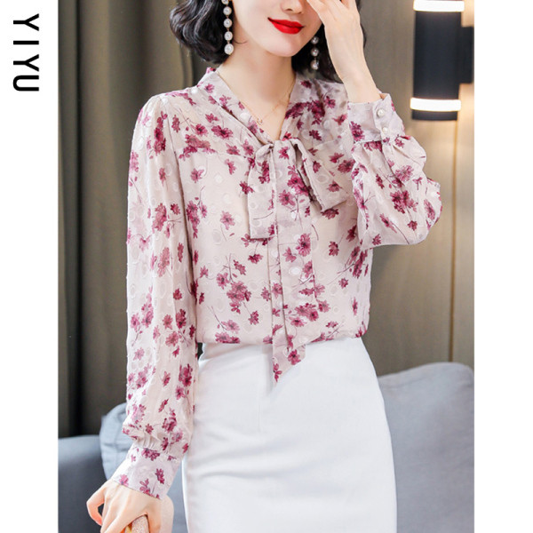 Színes női ing virágmintával és szalaggal