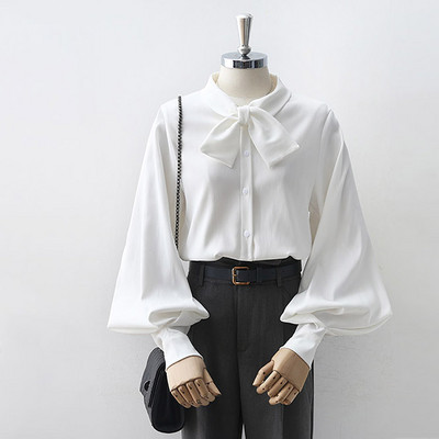 Modern női ing gallérján szalaggal és széles ujjakkal