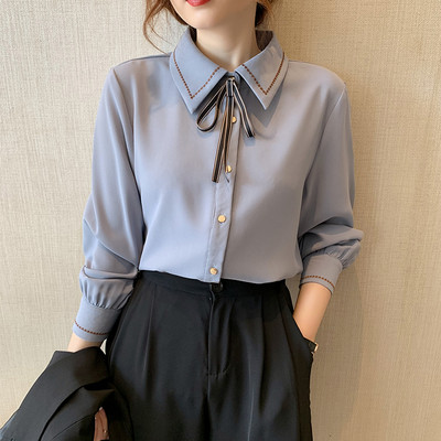 Ajakohane lipsude ja nööpidega naiste särk