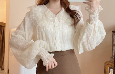 Naiste moodne nööpide ja spitsikaelusega särk