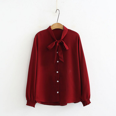 Vabaaja särk paela ja nööpidega