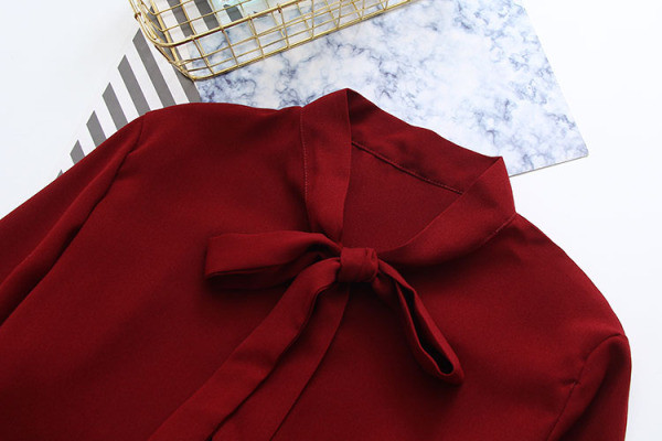 Vabaaja särk paela ja nööpidega