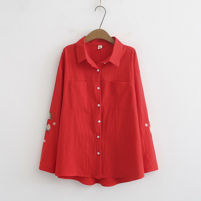 Moodne taskute ja tikanditega naiste särk