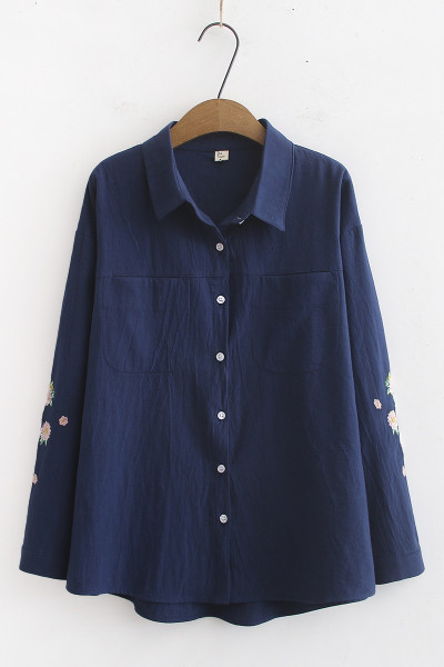 Moodne taskute ja tikanditega naiste särk