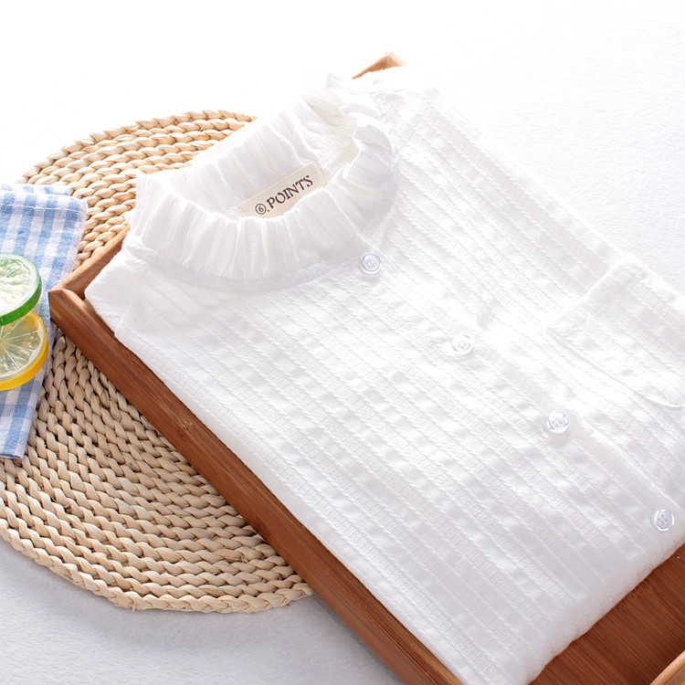 Naiste valge poolkõrge krae ja nööpidega särk