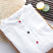 Női fehér ing színes gombokkal és zsebbel