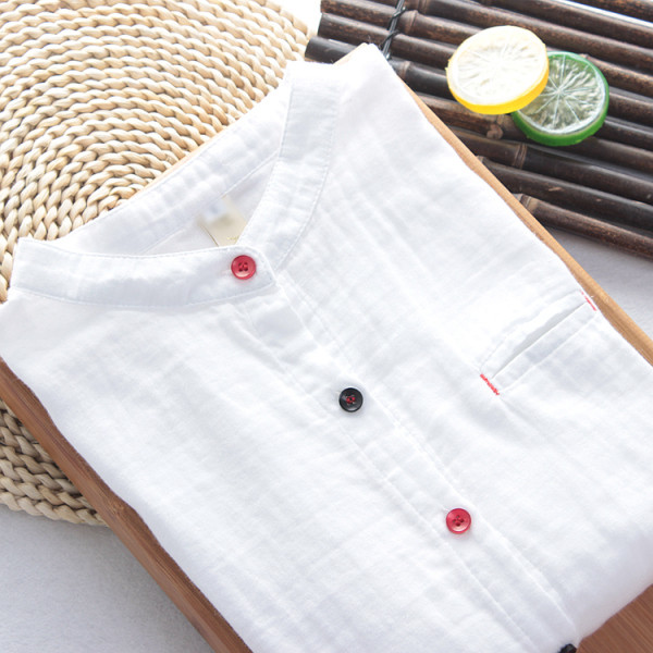 Női fehér ing színes gombokkal és zsebbel