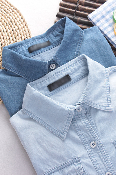 Naiste taskutega teksasärk