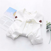 Modern női ing kerek nyakkivágással és fehér hímzéssel