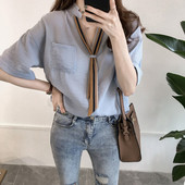 Modern női ing zsebbel