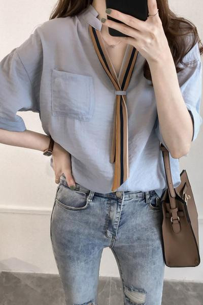 Modern női ing zsebbel