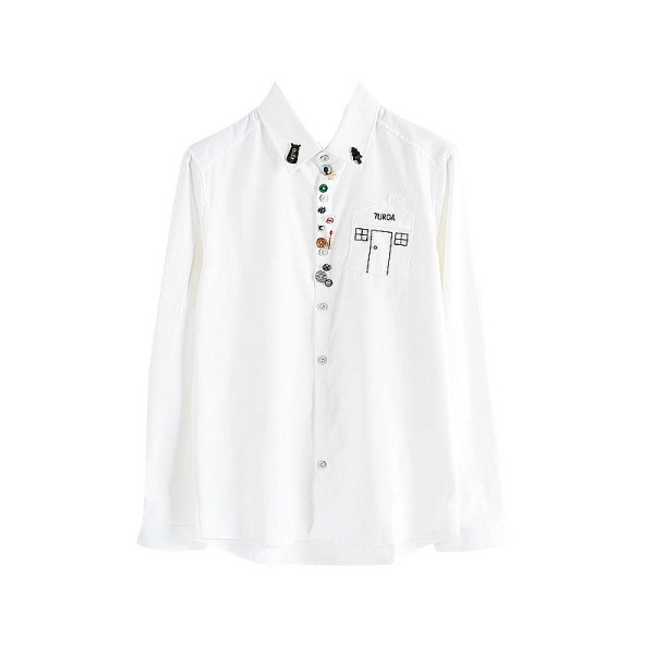 Tikandite ja värviliste nööpidega naiste särk