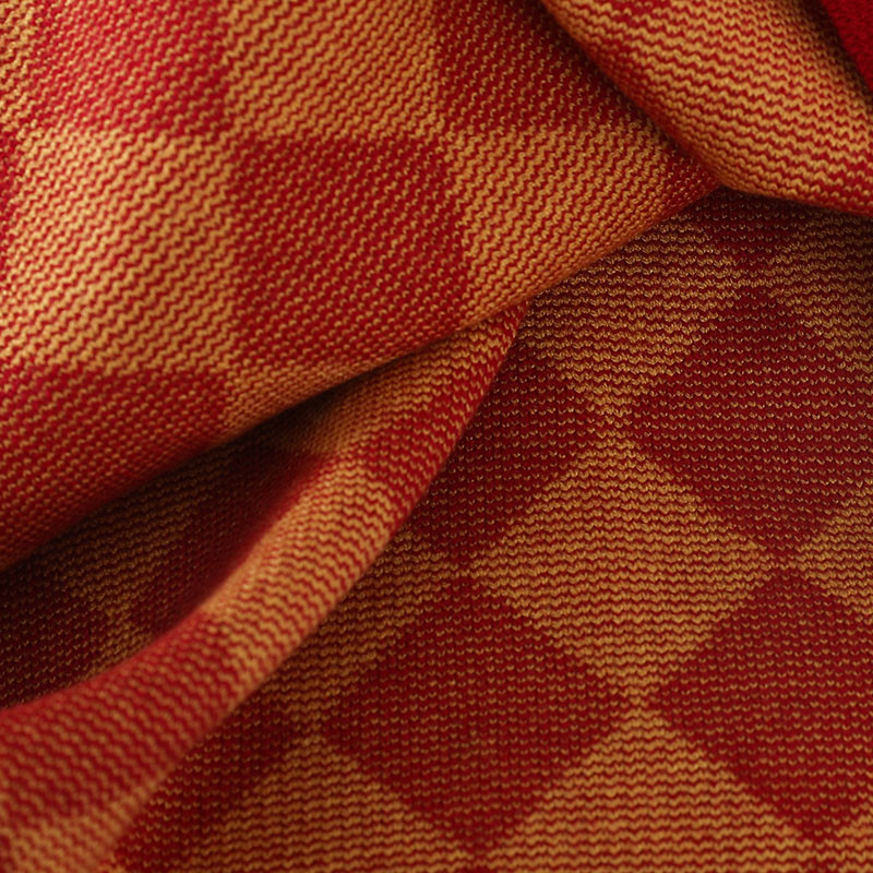 Цветен дамски комплект от две части-пола и жилетка