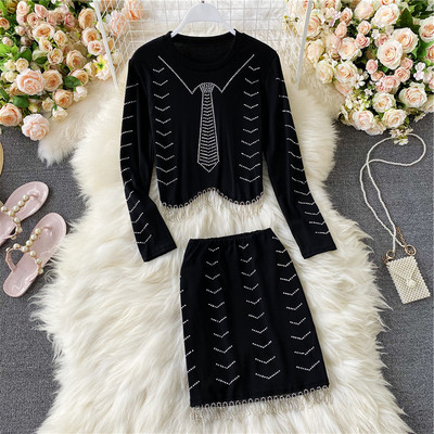 Ženski komplet u crnoj boji sa kamenčićima