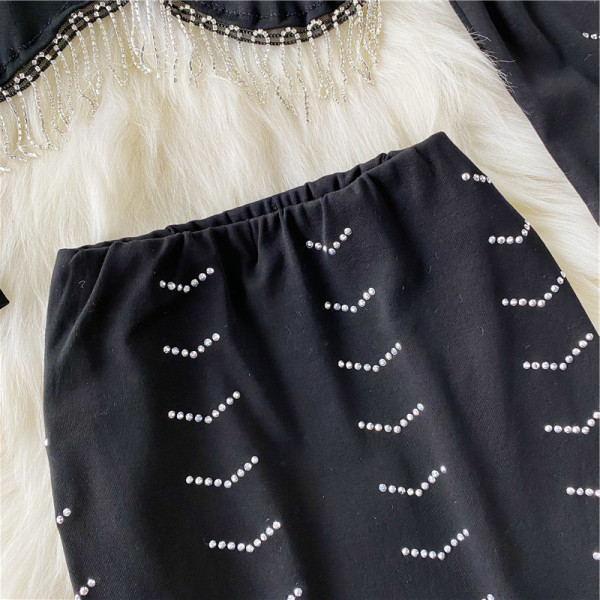 Ženski komplet u crnoj boji sa kamenčićima