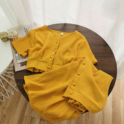 Νέο γυναικείο μοντέρνο σετ με κουμπιά