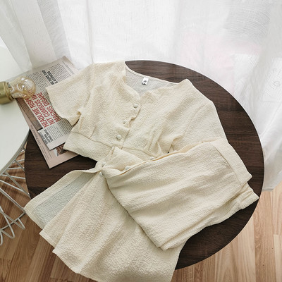 Νέο γυναικείο μοντέρνο σετ με κουμπιά