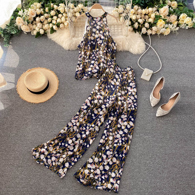 Värviline naiste ülikond koos pükste ja topiga