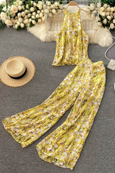 Värviline naiste ülikond koos pükste ja topiga