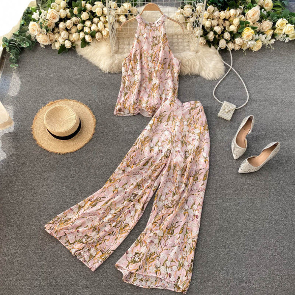 Värviline naiste ülikond koos pükste ja topiga