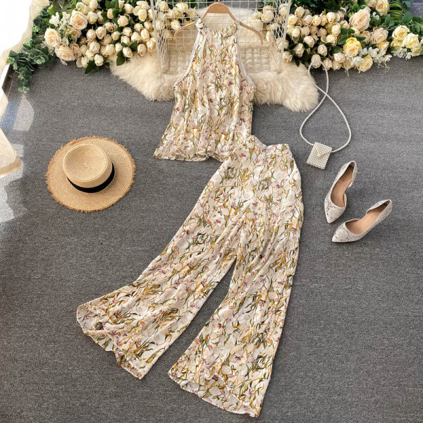 Värviline naiste ülikond koos pükste ja topiga