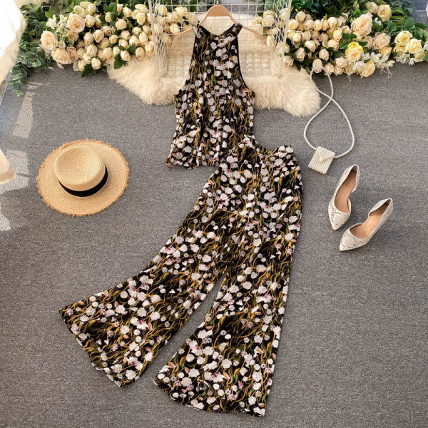 Värviline naiste ülikond koos pükste ja topiga