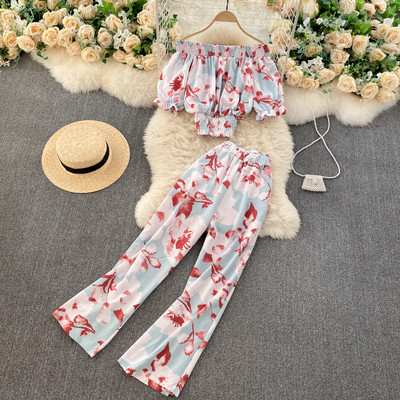 Πολύχρωμο γυναικείο σετ από κοντή μπλούζα και μακρύ παντελόνι με ελαστικό